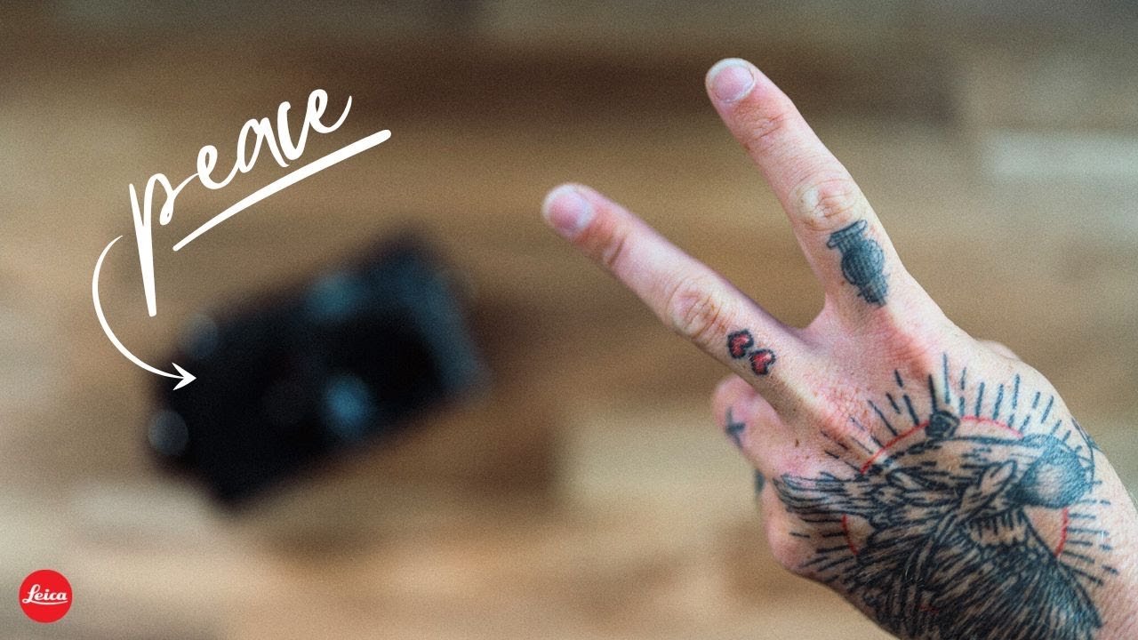 YouTube post by @davidherring for Audiio. Caption reads: NINE Leica Cameras I Sold and WHY.