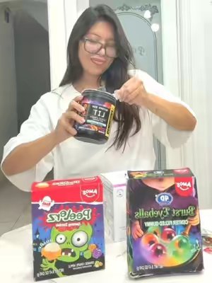 TikTok post by @_erikaabee for Amos Sweets. Caption reads: [...] routine a little spooky 👻🎃🍬 @Amos Sweets....