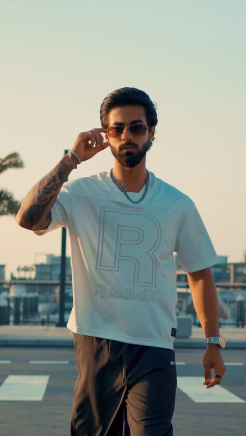 Instagram post by @anshhtaandon for Reebok Middle East & N.Africa. Caption reads: Sharp vision, steady steps. 
Outfit👕- @reebokmena....