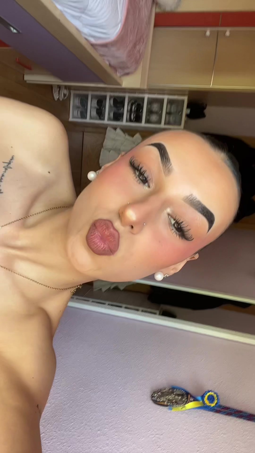 TikTok post by @iireneecc for Makeup Revolution. Caption reads: #publi Cuatro productos esenciales en vuestra....