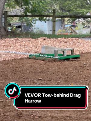 TikTok post by @eli_ousley for VEVOR Home Improvement. Caption reads: VEVOR Tow-behind Drag Harrow #graveldriveway....
