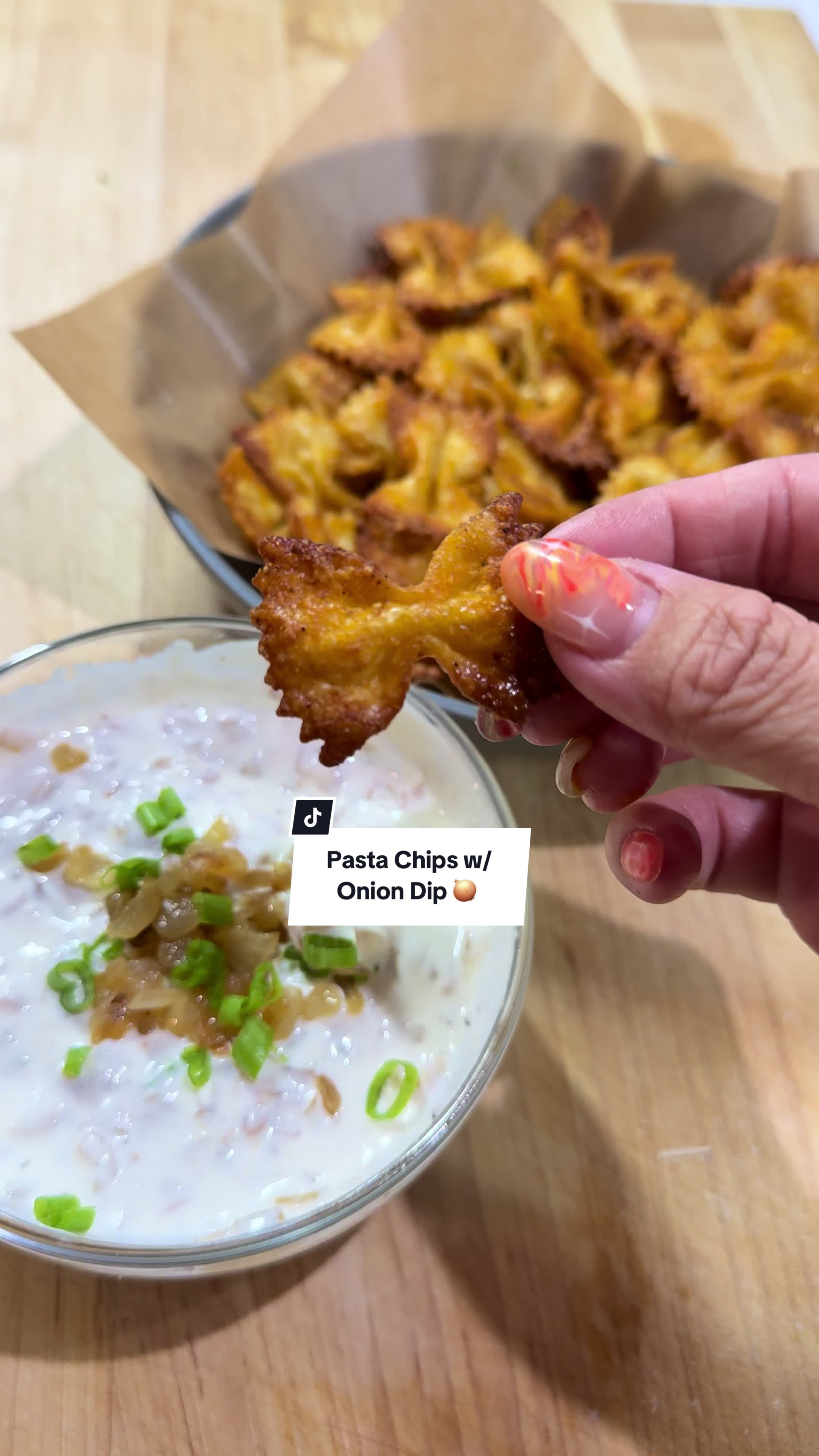 TikTok post by @bentonoods for Chefman. Caption reads: That crunch tho! Made to you by @Chefman 🧅🧀 Use....