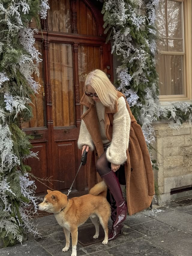 Instagram post by @macaroonsandroses for JustFab. Caption reads: [...] enjoying Christmas vibe and my new....