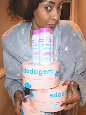 TikTok post by @curvvymandy for Megababe. Caption reads: @Megababe #megababe #bodyodor #bodypowder [...].