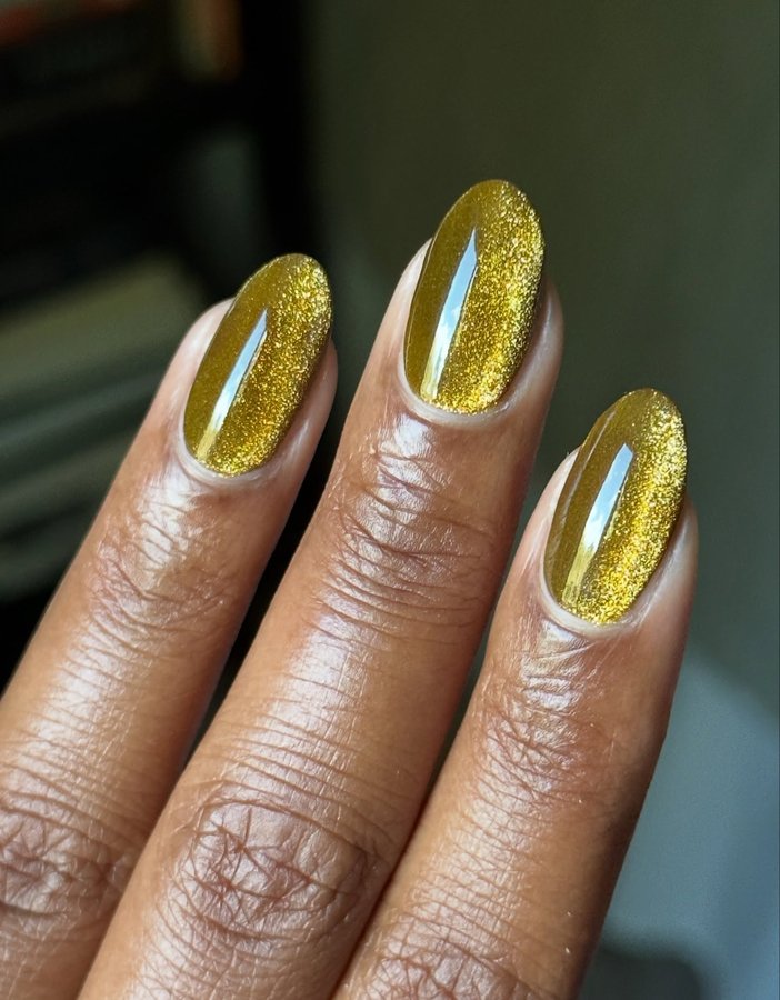 Instagram post by @melanated.mani for Cirque Colors. Caption reads: [...] @brushedbyb_ ‘s polish duo from....