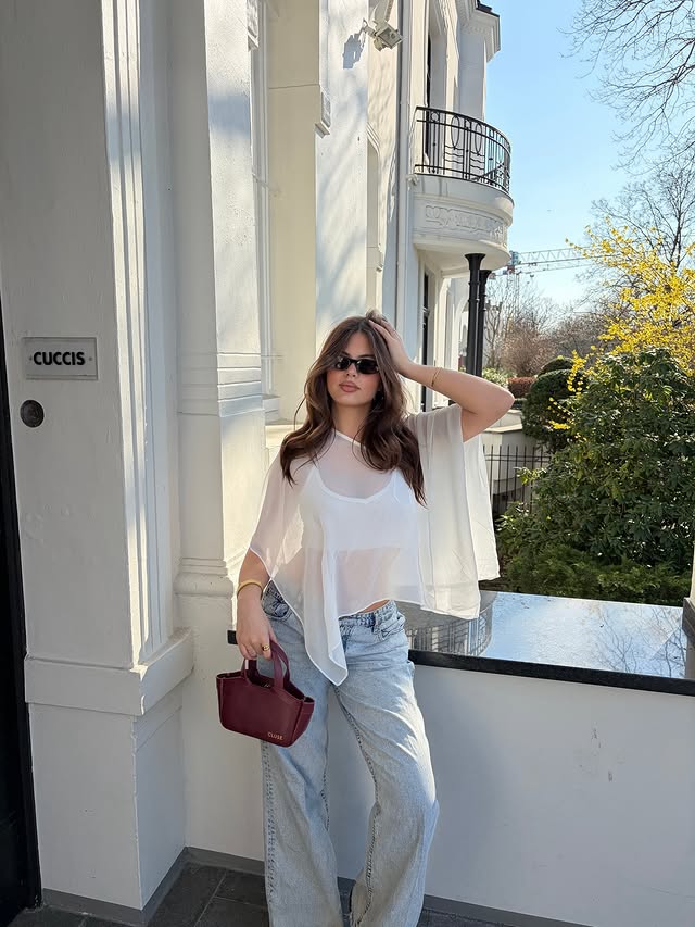 Instagram post by @carolinelassala for CLUSE. Caption reads: anzeige/ cutest purse from @cluse.
