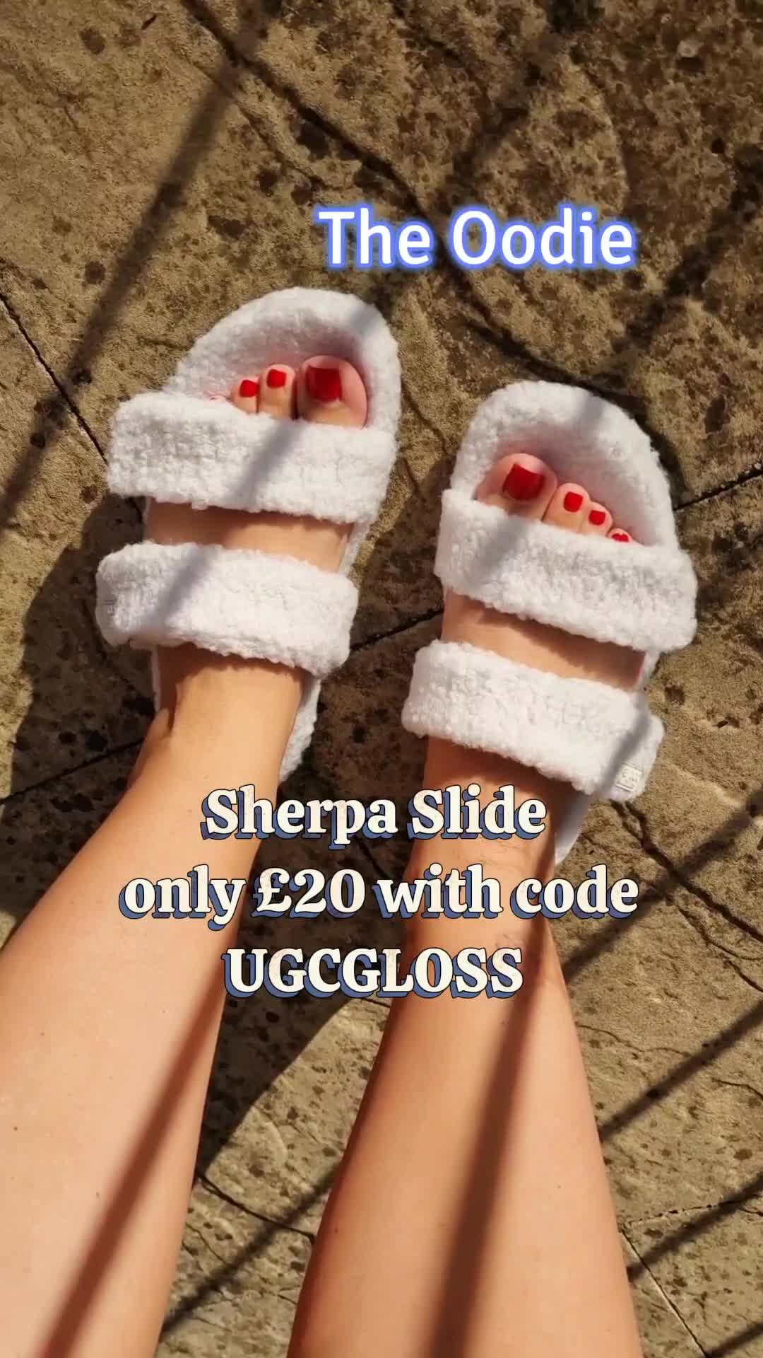 TikTok post by @ugc_gloss for The Oodie. Caption reads: Peak comfy vibes 👣 The Oodie Sherpa Slide are £20....