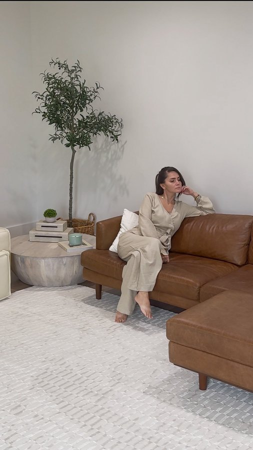 Instagram post by @cantinhonoseua for Revival. Caption reads: A luxury rug isn’t just a design detail — it’s a....