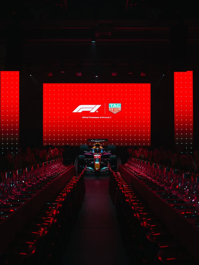 Instagram post by @fabientietjen for TAG Heuer. Caption reads: [...] Chronograph in motion. Trackside with....
