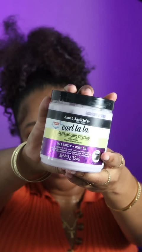 Instagram post by @_kiraforeva for Aunt Jackie's Curls & Coils. Caption reads: Curl La La - New Look, same amazing and hydrating....