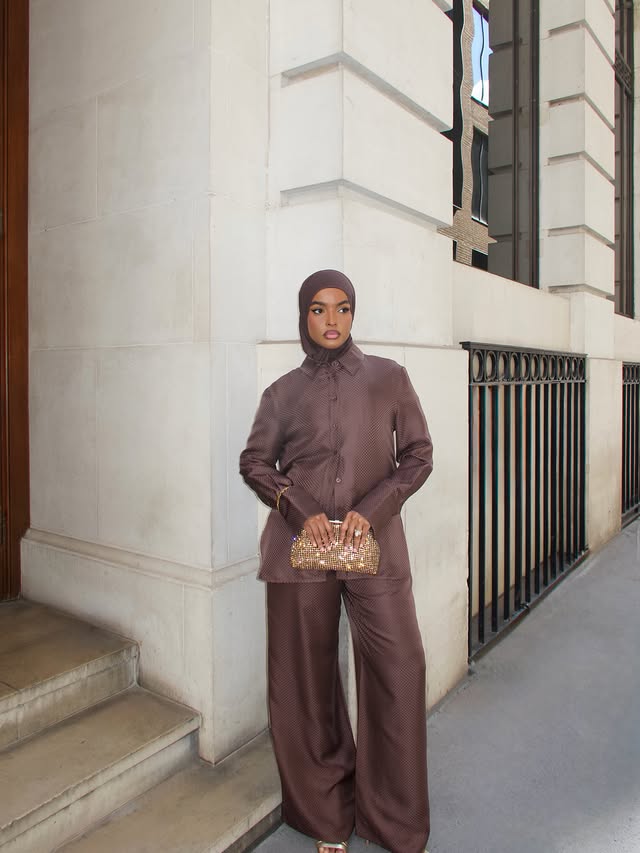 Instagram post by @sailingnas for Reiss. Caption reads: [...] feel so put together in a silk co-ord🤎....