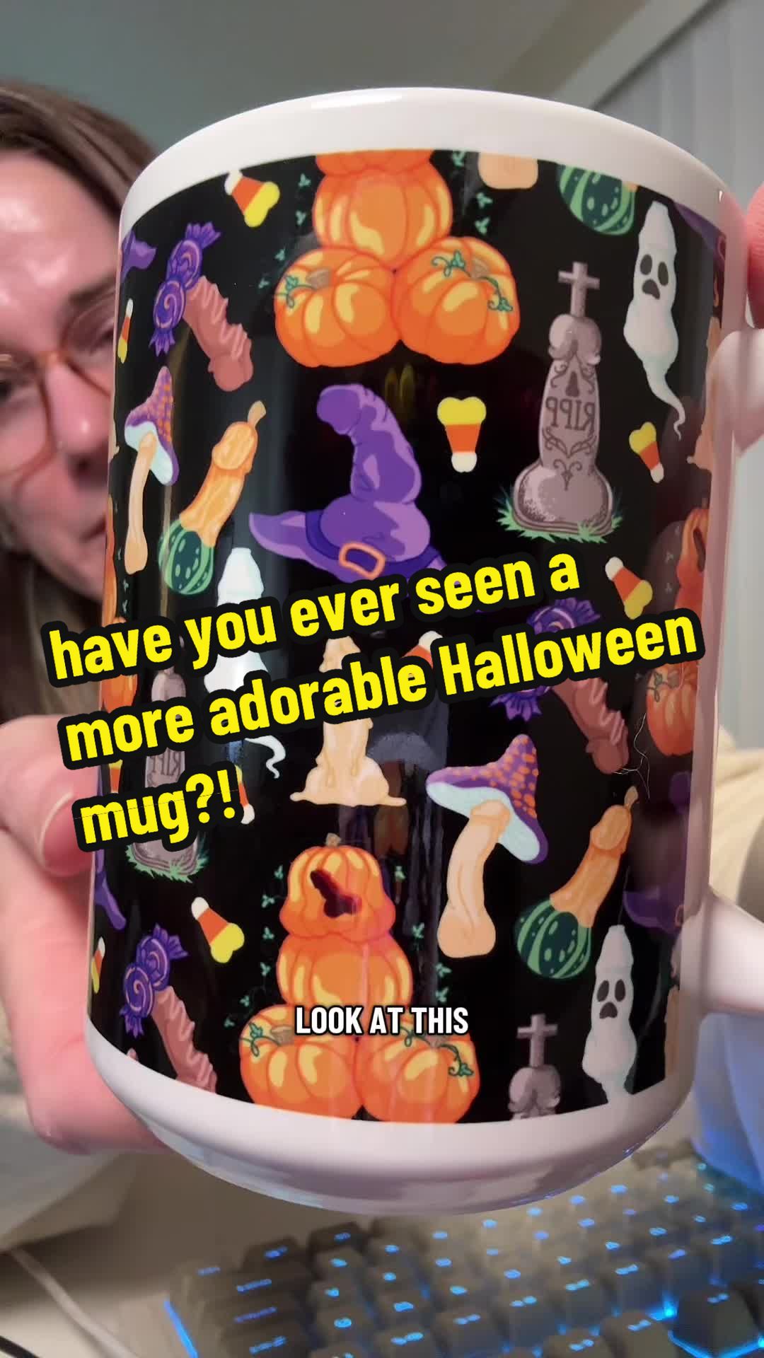 TikTok post by @beautyintheblasphemy for LookHUMAN. Caption reads: [...] seen a more adorable Halloween mug?....