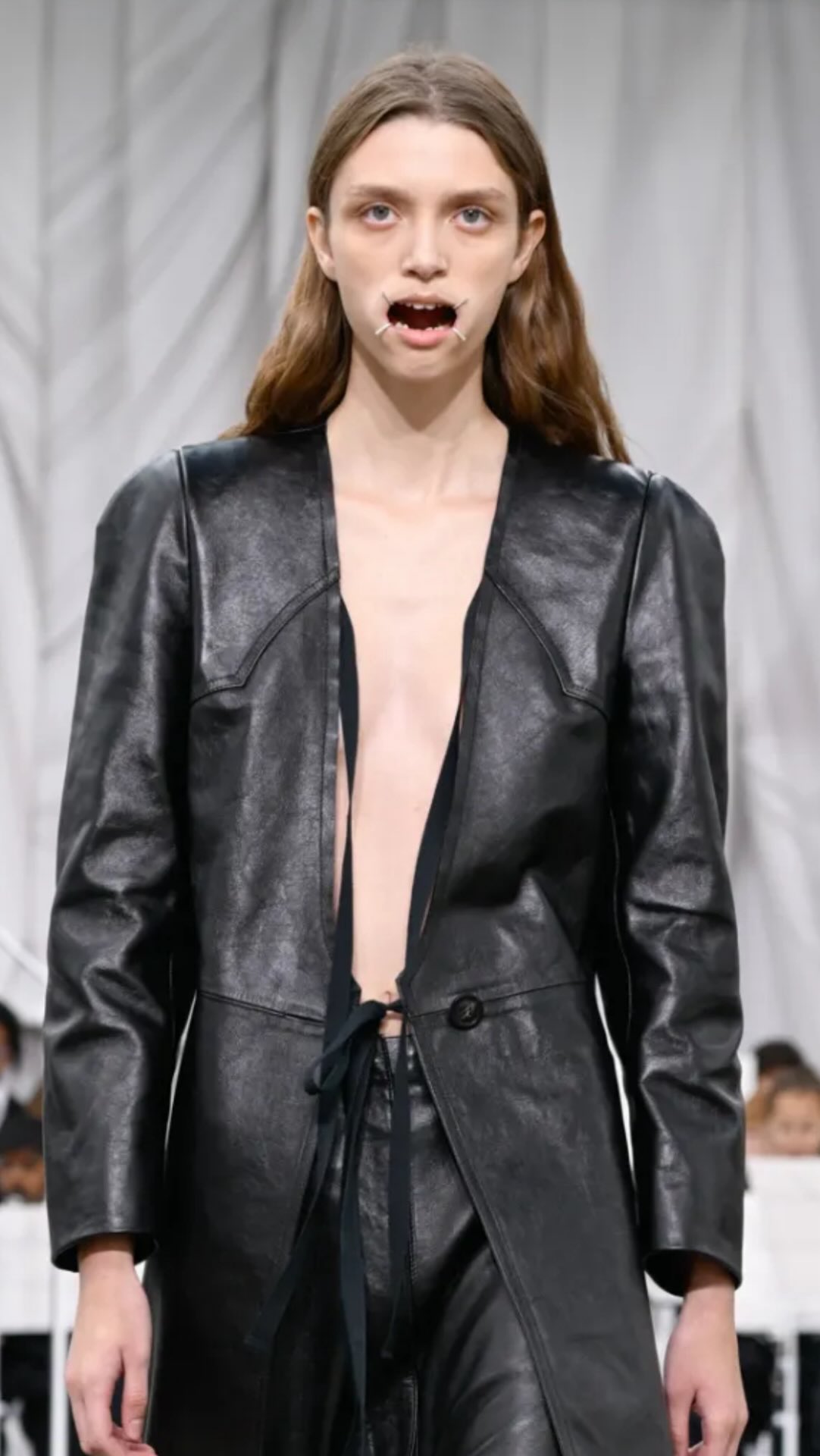 Instagram post by @fashion_critical for Maison Margiela. Caption reads: My lips are sealed. @maisonmargiela.