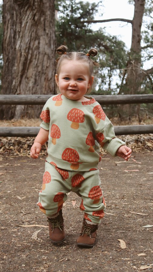 Instagram post by @jacqueline_taylor_wilson for MiniOlie. Caption reads: Butterflies, mushrooms, and a little bit of magic....