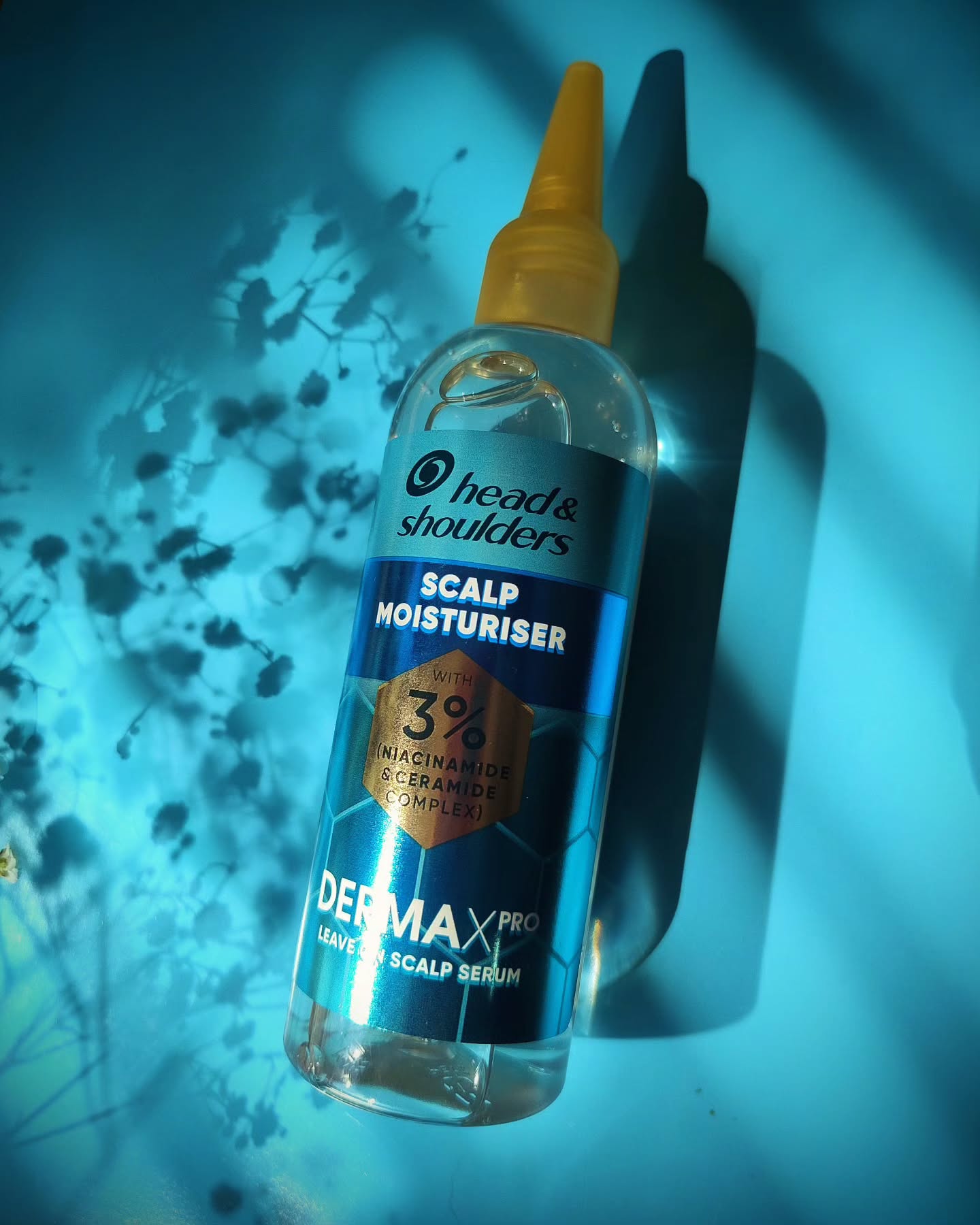 Instagram post by @malgorzata.wojas for SuperSavvyMe. Caption reads: I’ve been trying out the Head & Shoulders DermaX....