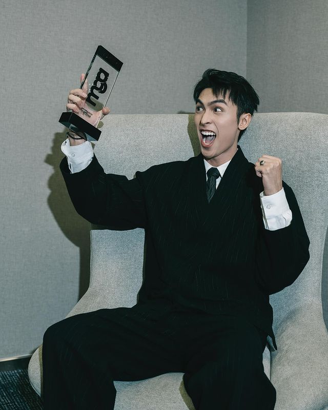 Instagram post by @congduongxx for KENZO. Caption reads: Night to remember 🏆 
Special thanks to @kenzo and....