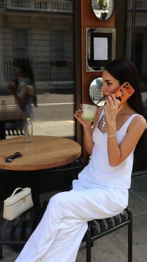 Instagram post by @malaecah for Abercrombie & Fitch. Caption reads: summer in the city wearing @abercrombie linen....