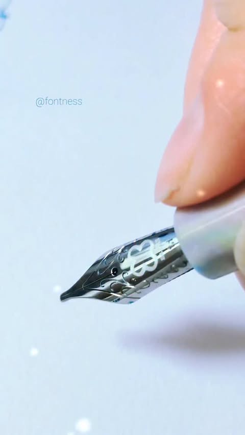 Instagram post by @fontness for Ferris Wheel Press. Caption reads: POV: just one scribble line with your fountain....