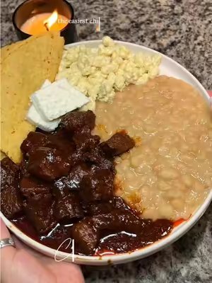 TikTok post by @theonlynaomix for EZ Bombs. Caption reads: @EZ Bombs #chilecolorado🌶 #mexicanfood #dinner....