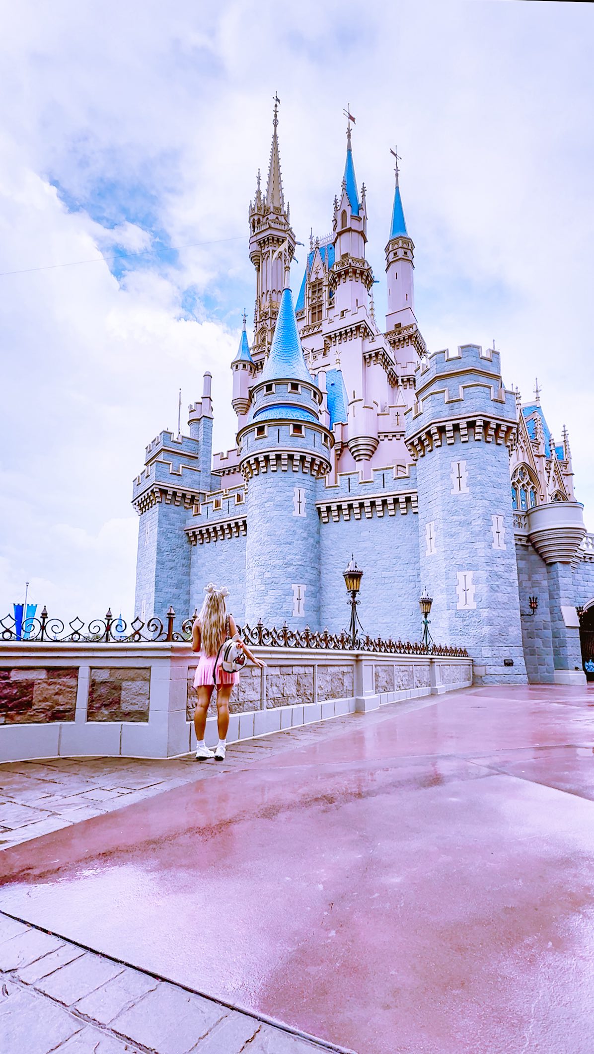 Instagram post by @aliceclarkpayne for Disney Store. Caption reads: Grwm for a pink ghostie Disney workout at Magic....