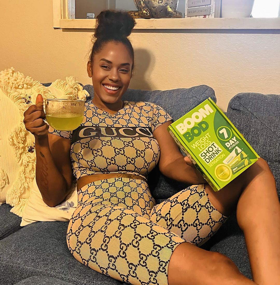 Instagram post by @m0ney_mel for Boombod. Caption reads: #ad Feeling extra motivated, and getting the most....