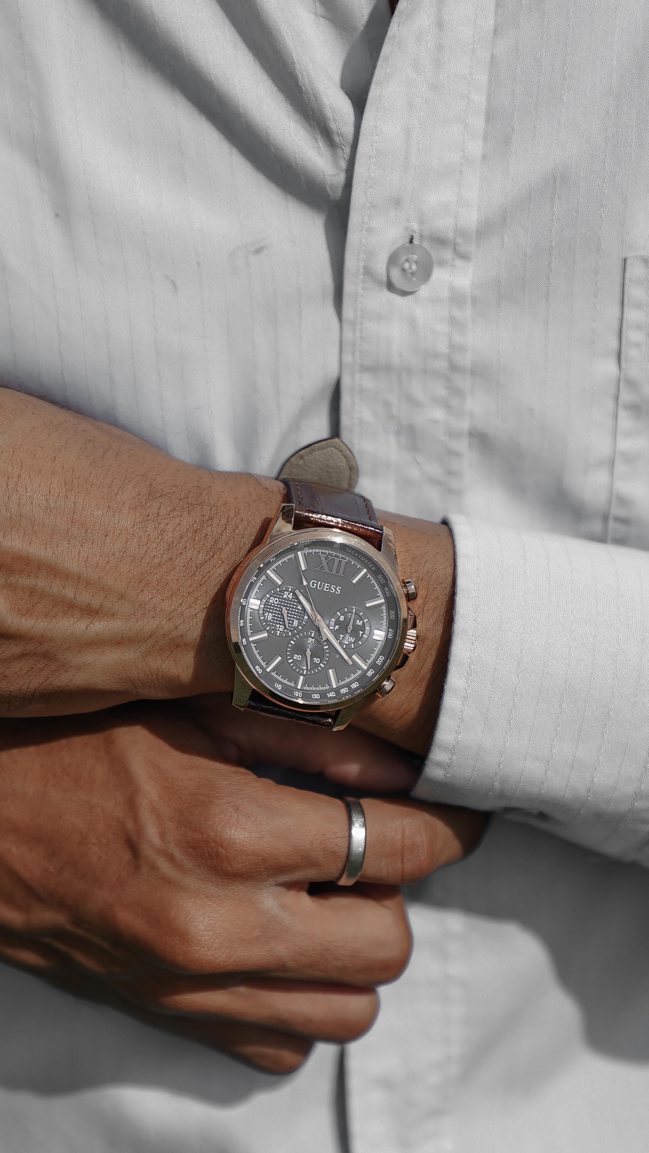 Instagram post by @aawan.setiawan for GUESS Watches. Caption reads: Wander in Bloom 

Moments of elegance, wherever....