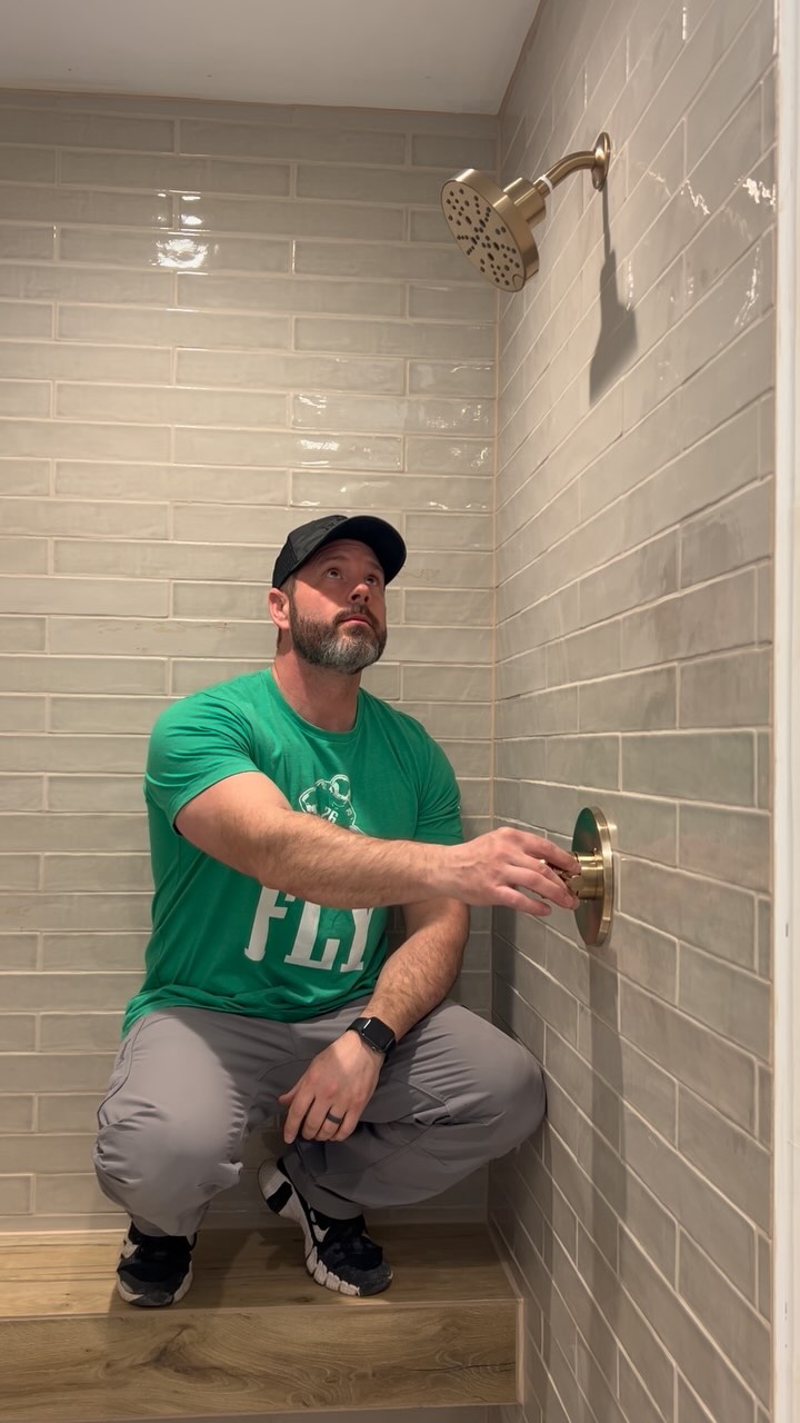 Instagram post by @jlmwoodworks for Delta Faucet. Caption reads: The last piece of my shower!! ✅ @deltafaucet....