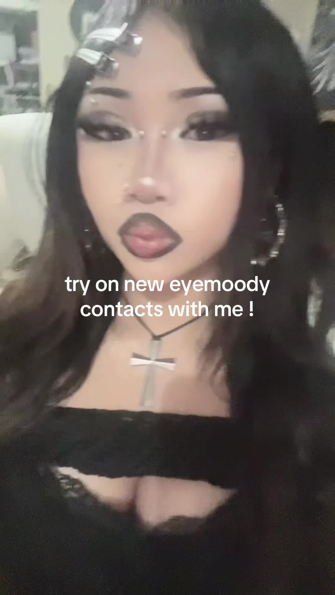 TikTok post by @semanticals for Eyemoody. Caption reads: so cutee @Eyemoody Colored Contacts || use code....