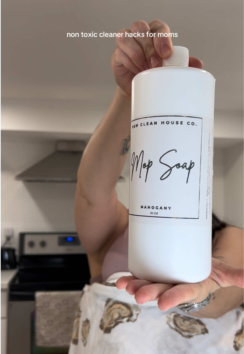 TikTok post by @sierra.catarina for H&W Bath Haus. Caption reads: [...] with this mop soap concentrate from @H&W....