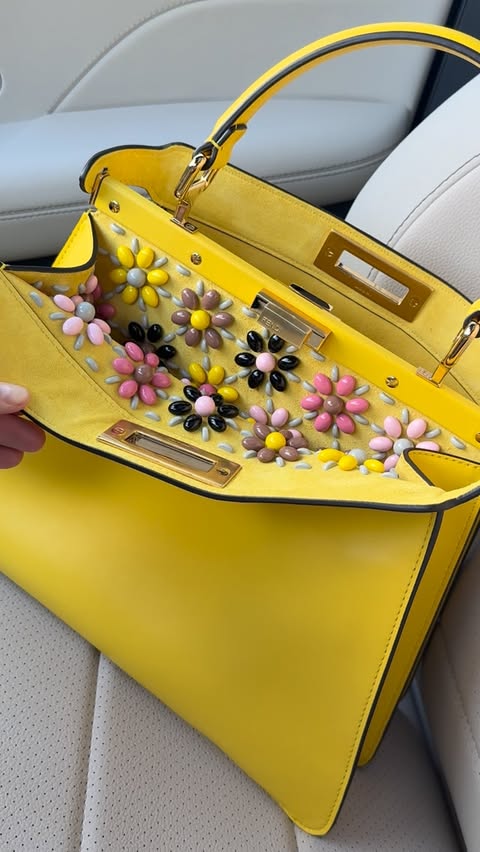 Instagram post by @paigegoesposh for Fendi. Caption reads: Peekaboo! She’s a daisy loving @fendi girl 🌼....