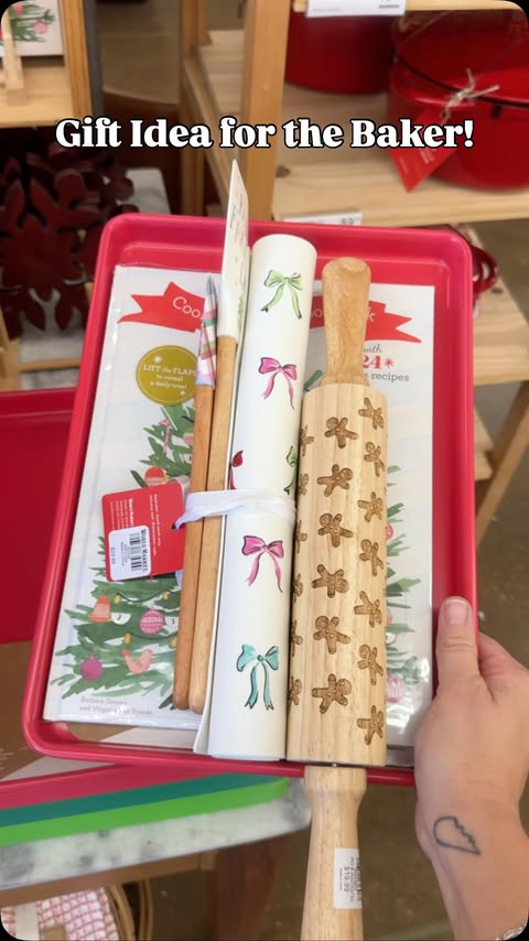 Instagram post by @trendyfavefinds for World Market. Caption reads: This advent cookie cookbook was such a hit last....