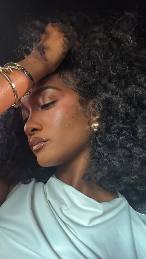 Instagram post by @tatyanaalii_ for Garnier. Caption reads: [...] + softness that your curls crave @garnierusa....