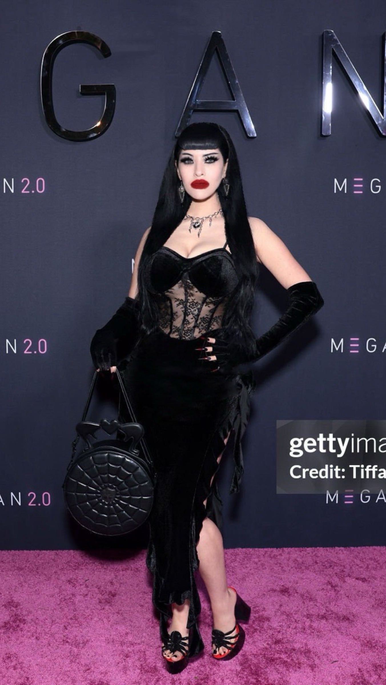 Instagram post by @victoriavenin for Dolls Kill. Caption reads: 🕸️🥂🖤🕷️🖤🥂🕸️

Megan 2.0 x Victoria Venin....