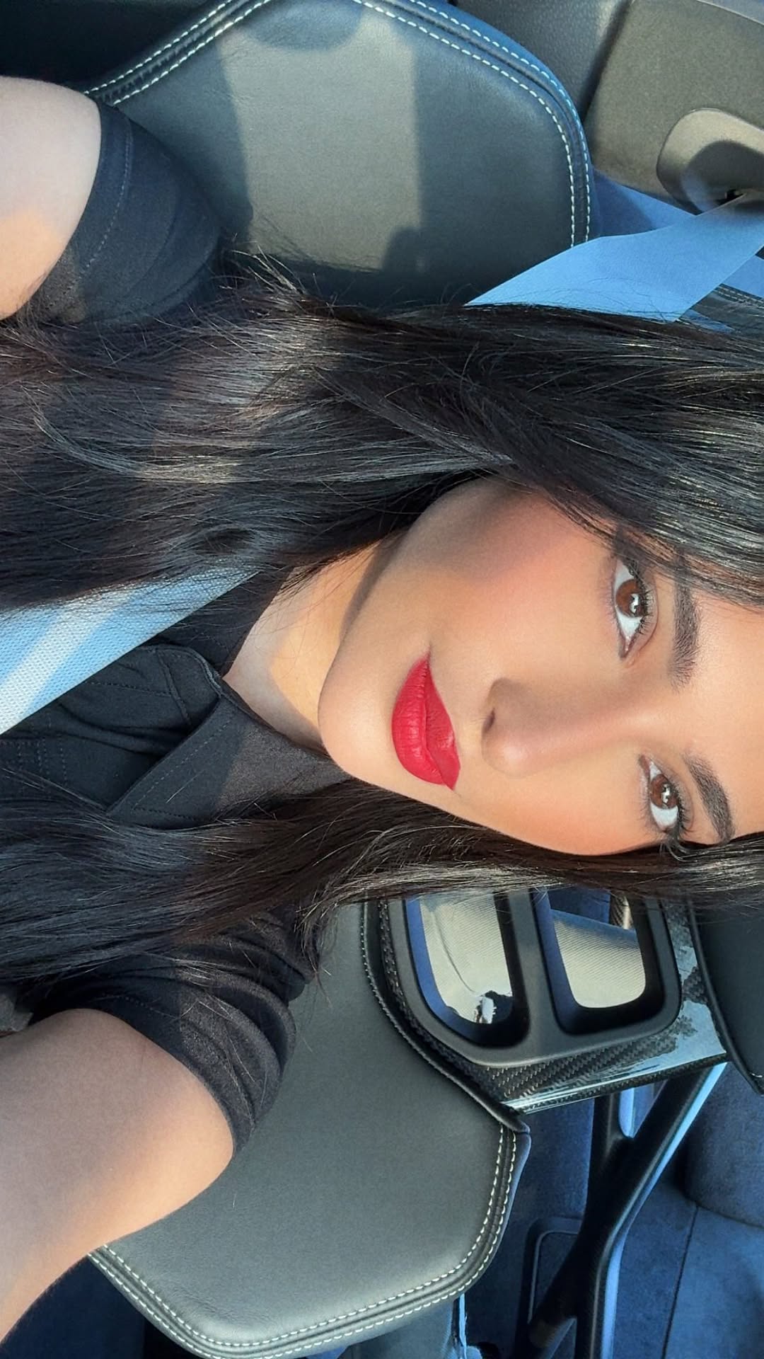 Instagram post by @amnalqubaisi_official for Givenchy Beauty. Caption reads: Don’t say I didn’t warn you! L’Interdit Parfum by....