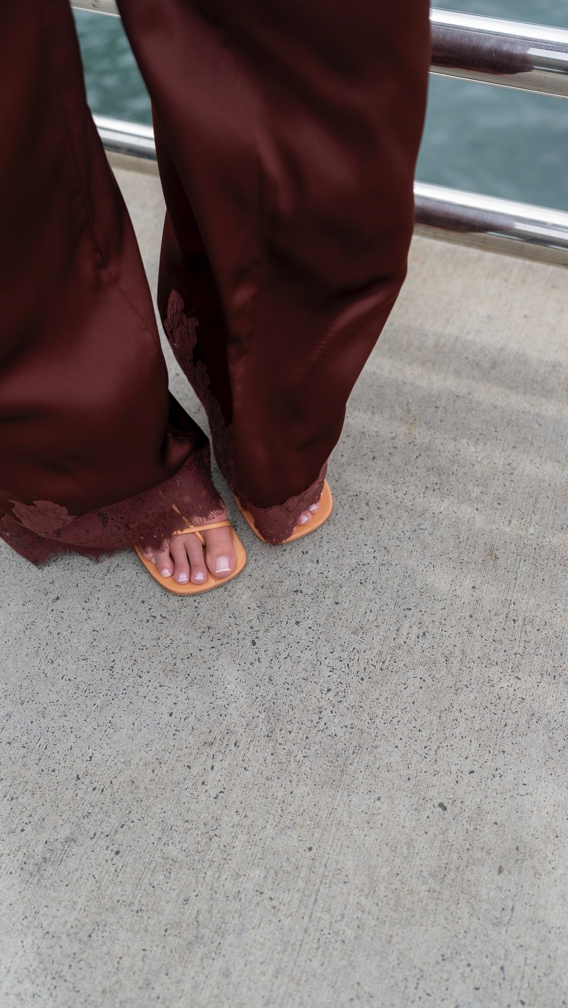 Instagram post by @laurahazzouri for NET-A-PORTER. Caption reads: this lace set adding a romantic touch to my....