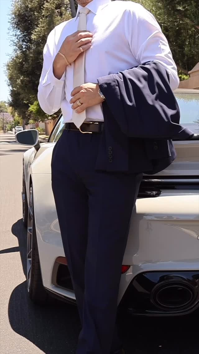 Instagram post by @heathhussar for The Black Tux. Caption reads: Suited and booted @theblacktux #ad.
