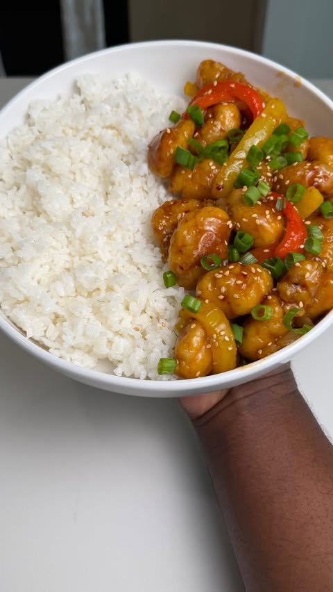 Instagram post by @mex_cooks for InnovAsian Cuisine. Caption reads: General Tso’s Chicken w/ Sticky White Rice 🍗🍚....