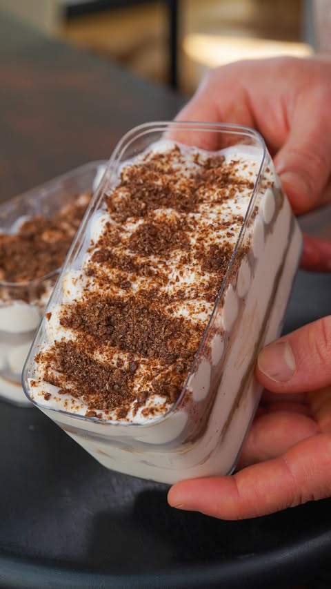 Instagram post by @theflexibledietinglifestyle for Oikos Cooperação e Desenvolvimento. Caption reads: 😮‍💨 High Protein Cereal Milk Tiramisu....