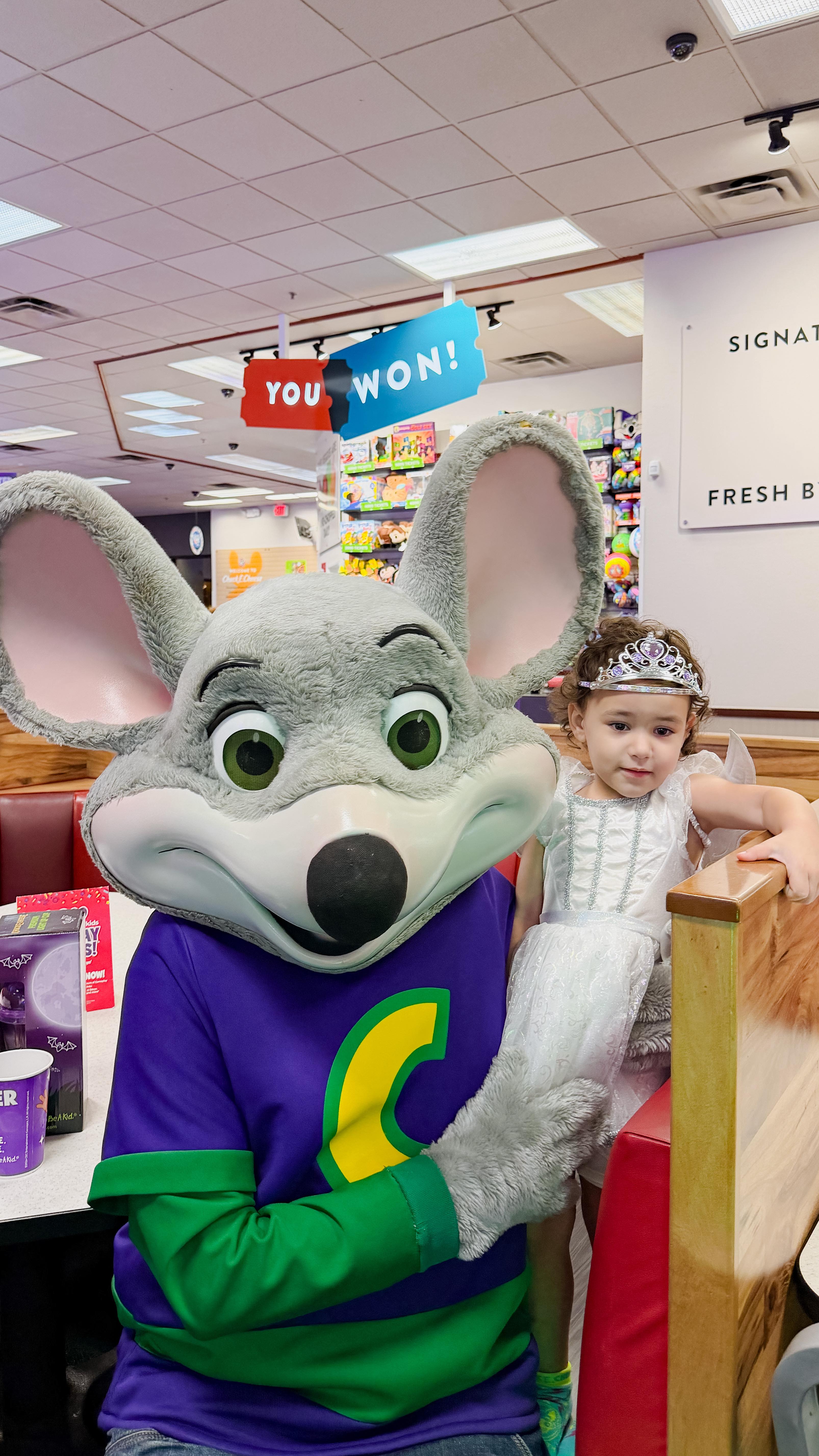 Instagram post by @esragurayman for Chuck E. Cheese. Caption reads: We took Arya and Arda to @chuckecheese Chuck E.....