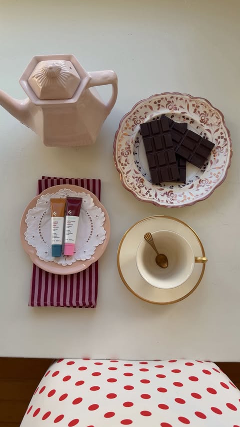 Instagram post by @amelia.edmondson for Glossier. Caption reads: the holiday treat that keeps on giving @glossier....