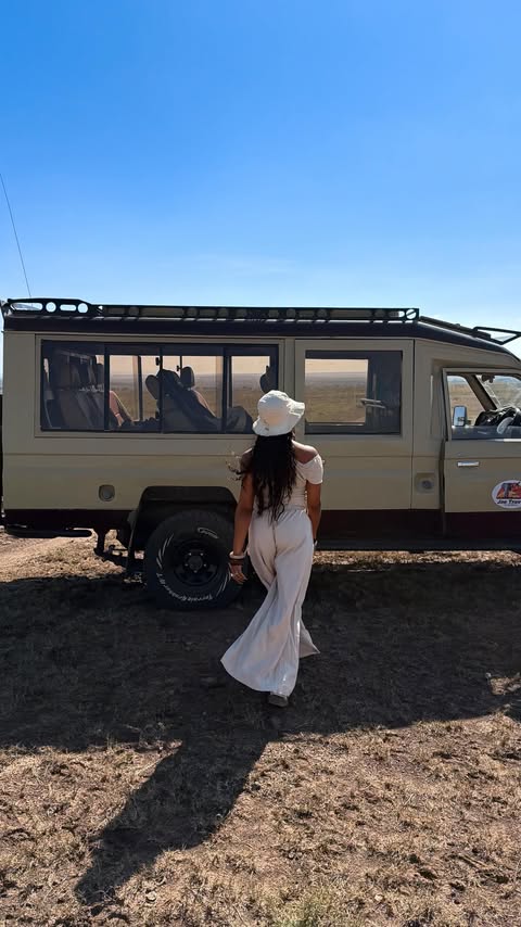 Instagram post by @bellamerlot_ for TOPICALS. Caption reads: [...] Safari  content 🇰🇪🦒🦍
 (can’t fly without....