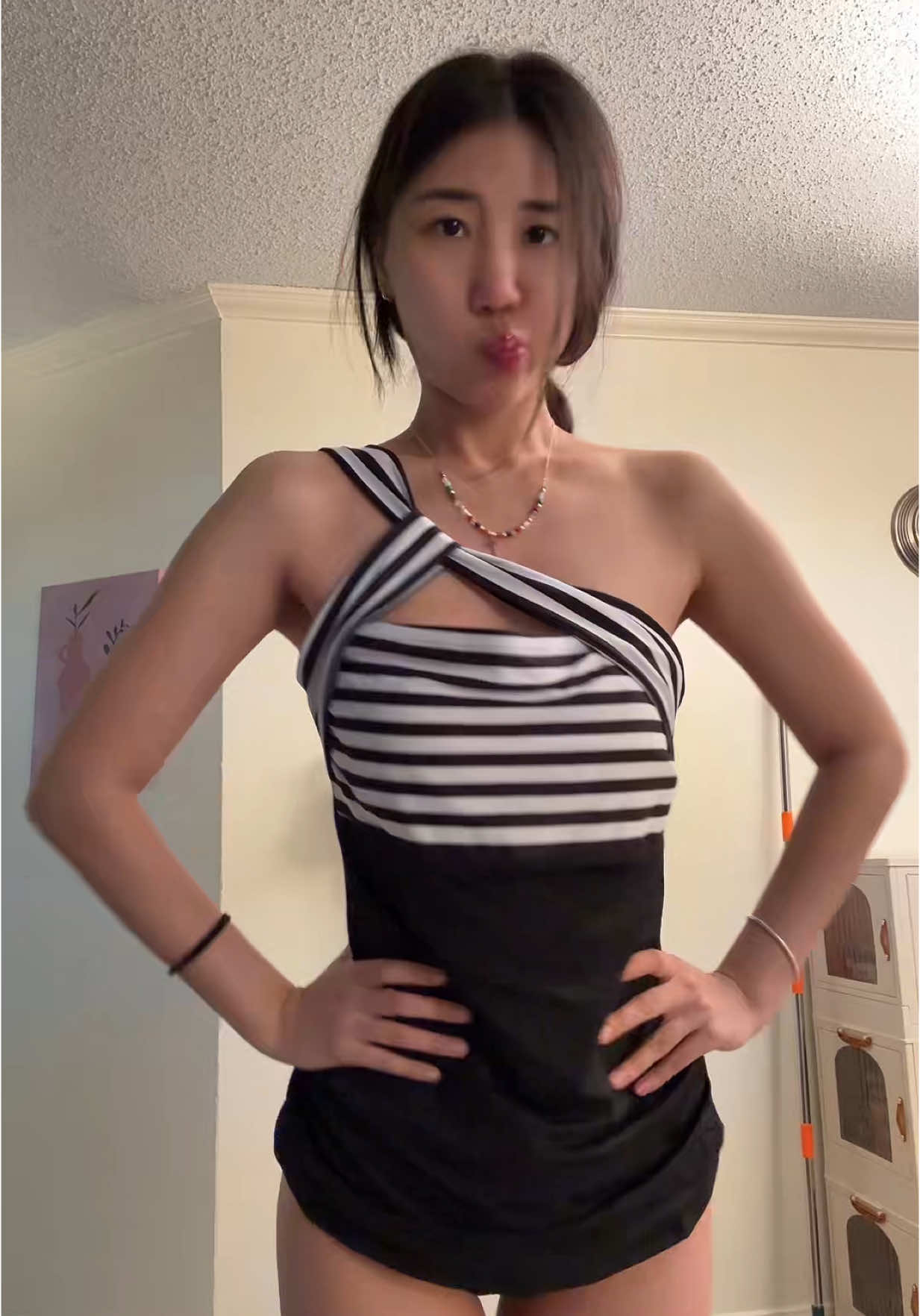 TikTok post by @hannahmao50 for Tempt Me Swimsuits. Caption reads: @TEMPT ME SWIMSUIT  #pmo #fyp #swimsuit .