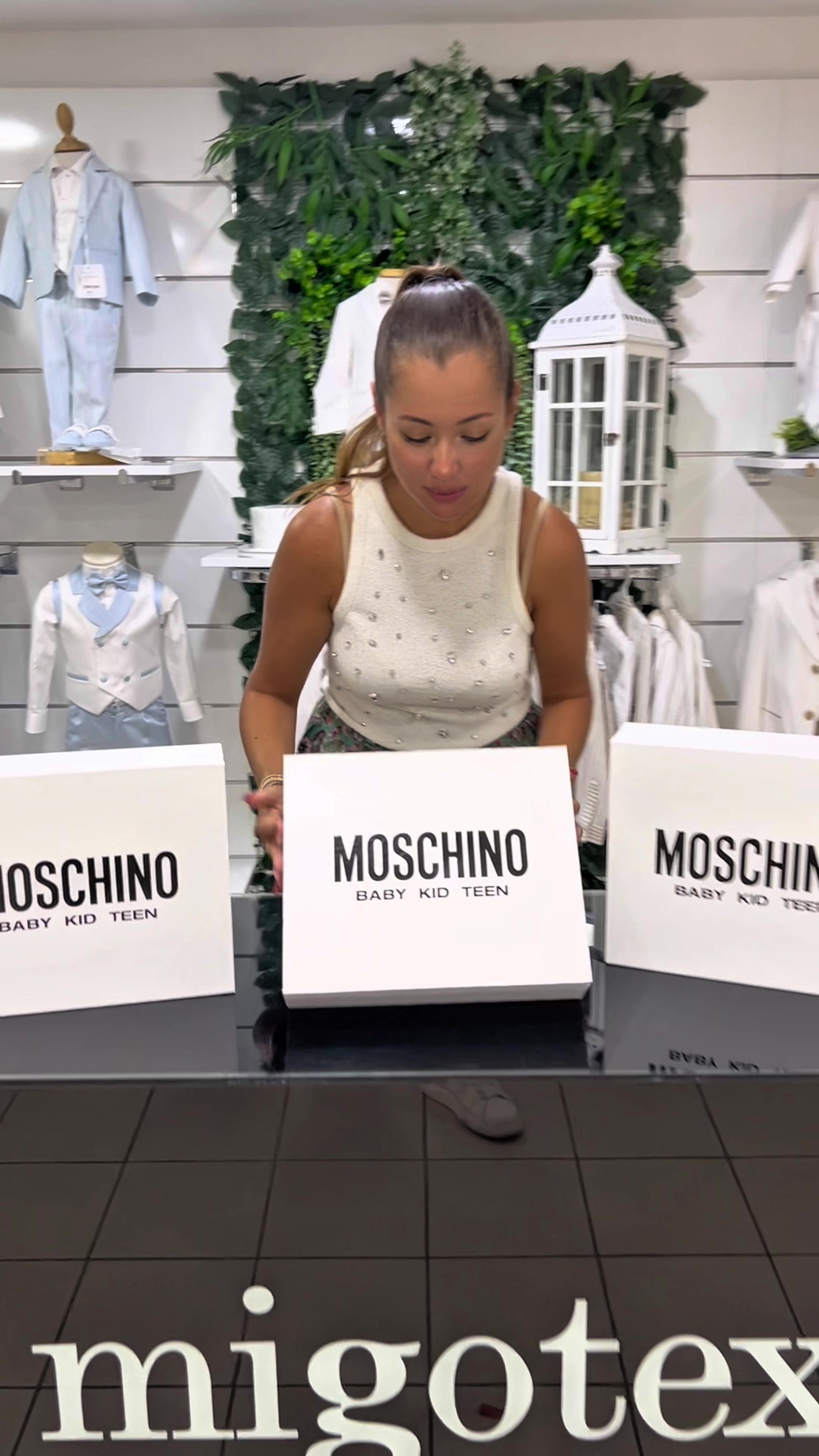 TikTok post by @migotex for Moschino. Caption reads: Dolcissime tutine Moschino ❤️ @Moschino Ordini....