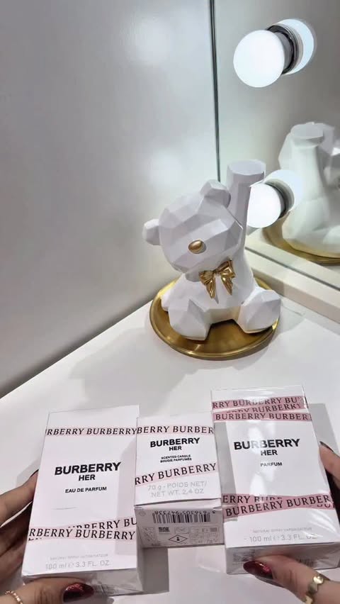 Instagram post by @iqrashahbaz110 for The Perfume Shop. Caption reads: Such a beautiful and thoughtful delivery. Burberry....