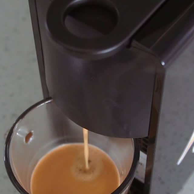 Instagram post by @zii_molepo for L'OR ESPRESSO. Caption reads: The key to a perfect morning? A rich, bold cup of....