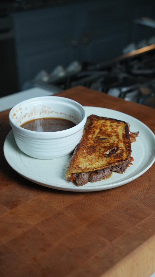 Instagram post by @cookitwithtim for ThermoWorks. Caption reads: Smoked Birria Tacos are simply the best and there....