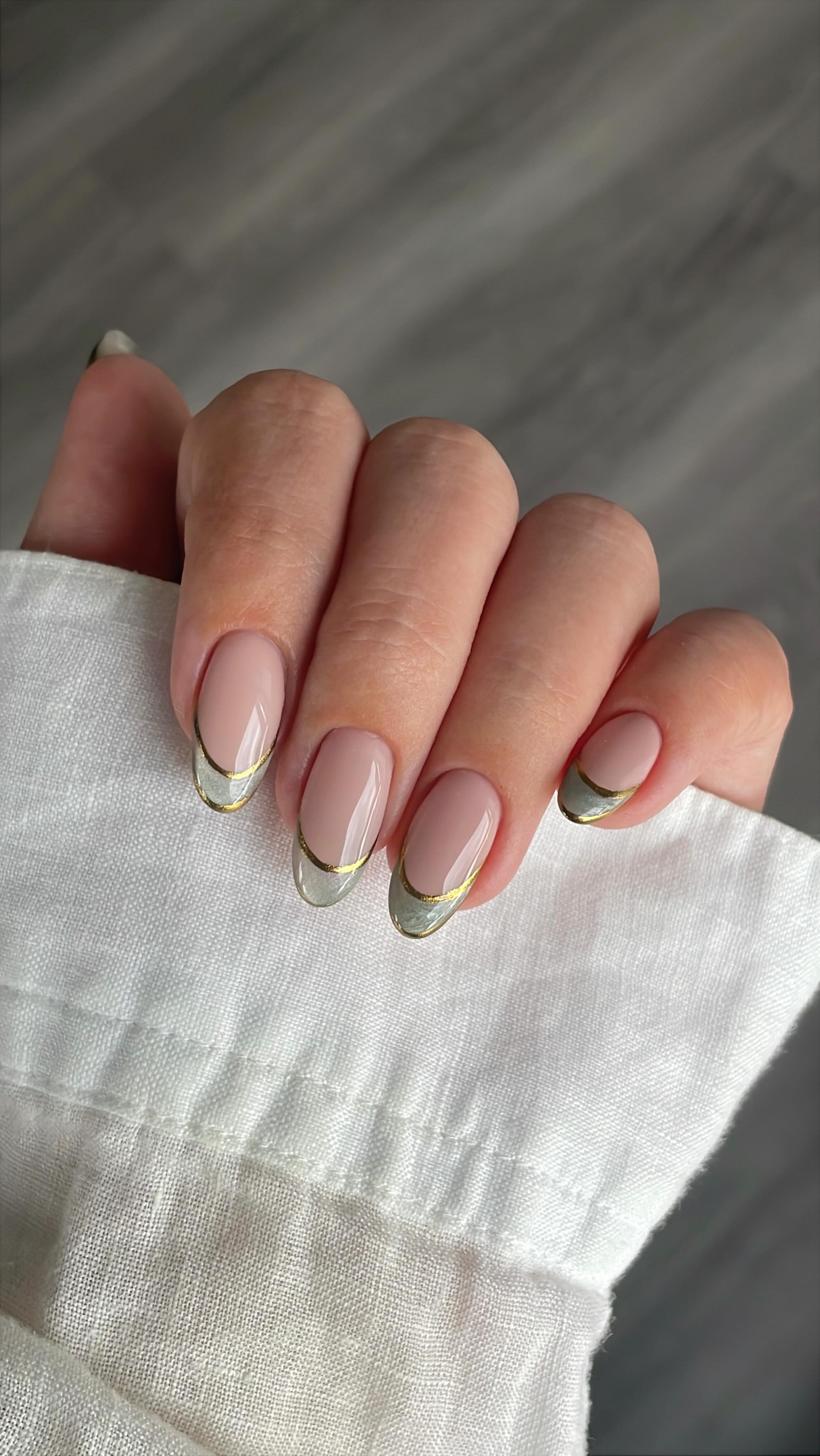 Instagram post by @simlynail for Modelones. Caption reads: ad • cat eye french tips with chrome....