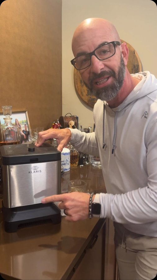 Instagram post by @johnnydrinks_ for KLARIS. Caption reads: [...] dad, how do you make clear ice? 🧊....