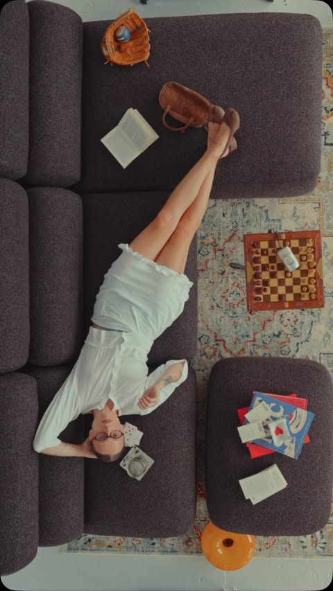 Instagram post by @lara_bsmnn for Tylko. Caption reads: [...] Sofa in Deep Brown Melange Bouclé by @tylko....