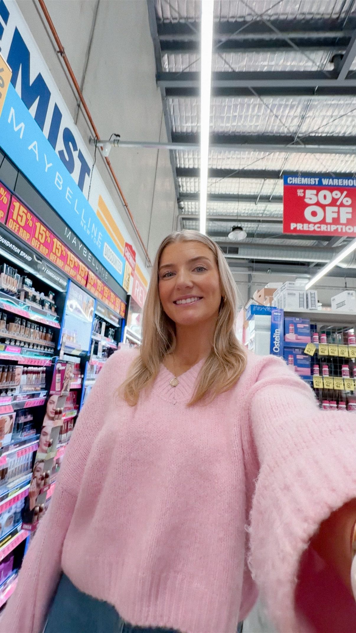 Instagram post by @emilyelizabeth.w for Chemist Warehouse. Caption reads: Find my favourites (half price too 👀) during the....